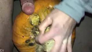 Guy in Uniform Fucks a Pumpkin for Halloween