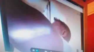 Uniformed Doctor Fists Himself at Desk in Clinic