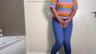 Blonde MILF Wets Tight Jeans in Bathroom Lock-In