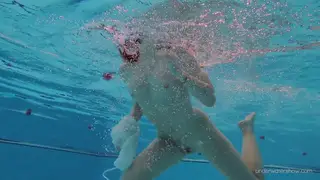 Busty European Brunette Swims Nude in Outdoor Pool