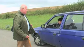 Busty Brunette Services an Older Gentleman with Her Mouth
