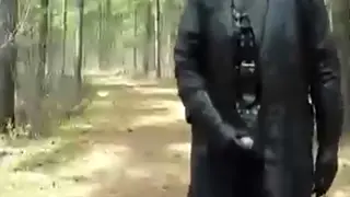 Leather-Clad Man Strokes Himself Outdoors in Public Woods