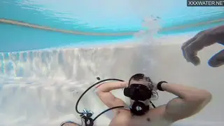 Young Couple Fucks Underwater in Pool Setting