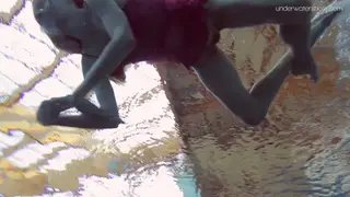 Petite European Brunette Teases in a Poolside POV Clip