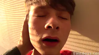 Smooth Twink Receives Expert Handjob to Cumshot