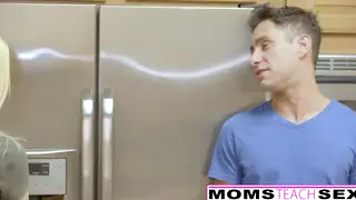 Stepmom Guides a Blonde MILF Through a First Threesome