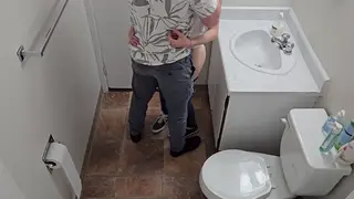 Slender Brunette Bent Over in Public Toilet