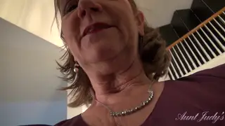 Redhead GILF Secretary Teases in Stockings and Lingerie
