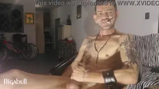 Mature Man Smokes While Pleasuring Himself