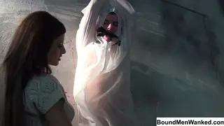 Dominant Woman Commands a Bound Submissive