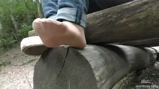 Nylon-Clad Feet Tease on Forest Floor in Tight Jeans