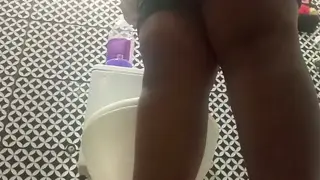 Busty Ebony Wife Teases in Public Bathroom Lingerie