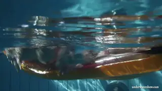 Busty Lesbians Share Intimate Poolside Pleasure and Pissing