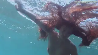 Redhead Teen Dances Erotic Underwater in Pool