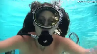 Busty Teen Enjoys Solo Pleasure in the Pool