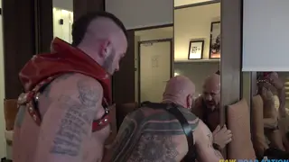 Tattooed Hunk Takes Bareback Ride From Leather-Clad Partner