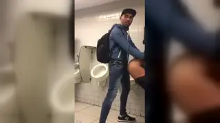 Latino Pair Gets Intimate in Bathroom Setting