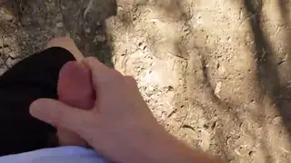 Hairy Stud Strokes Hard Cock Outdoors in Public