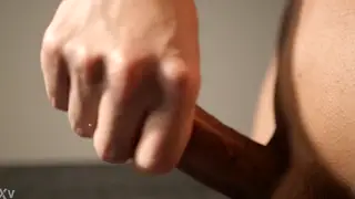 Japanese Guy Strokes Big Cock to Explosive Cumshot