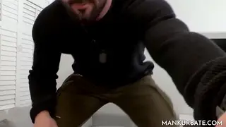 Muscular Jock Strokes Hard in a Bedroom