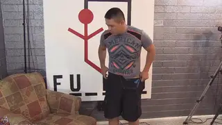 Masseur Works Over a Tense Client on the Table