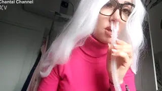 Glasses-Wearing Woman Teases in Sheer Lingerie and Miniskirt