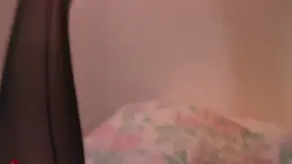 Brunette Wife Teases Husband With Feet in Lingerie