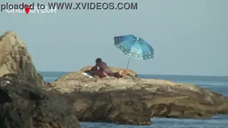 Blonde MILF Rides Lover on Public Beach