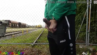 Amateur Strokes His Big Cock Outdoors Beside Passing Trains
