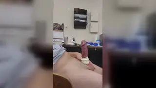 Teen Student Tests a Pump Toy at a Gym Desk
