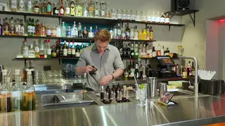 Busty Brunette Gives Deep Blowjob Outdoors for Drinks