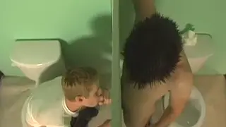 Twink Kneels at Gloryhole Serving Two Strangers Until They Spray