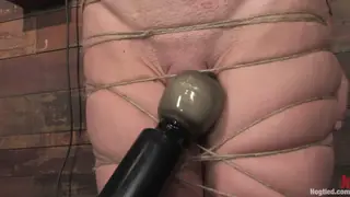 Blonde Tattooed Woman Endures Bondage and Fingering