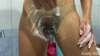 European Teen Shaves Hairy Bush Smooth in Shower