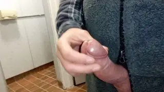 Mature European Daddy Strokes Uncut Cock in Public Restroom