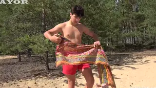 Twink Pair Trade Oral Pleasure on a Sunny Beach