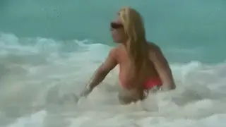Blonde Flaunts Big Tits on the Beach