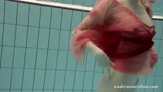 Blonde European Teen Reveals Red Lingerie in Pool