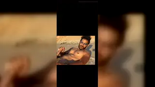 Tattooed Muscular Guy Strokes Big Cock on Nude Beach