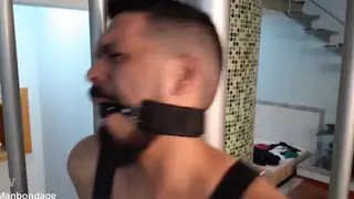 Submissive Guy Gags on a Ball Gag and Deepthroats Hard