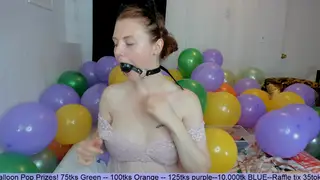 Redhead MILF Teases and Sucks Toy on Webcam