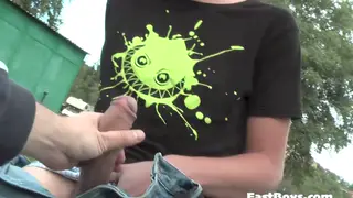 Twink Strokes Uncut Cock With Oil in Public