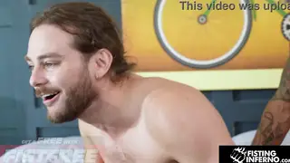 Muscular Hunk Takes a Massive Fist After Rimjob
