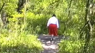 Busty Mature Woman Wets Her Stockings Outdoors