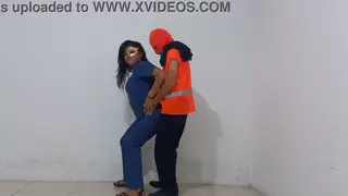 Latina Nurse in Hospital Uniform Services Cleaning Staff at Desk