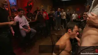 Hairy Twink Serves a Gangbang in a Leather Club