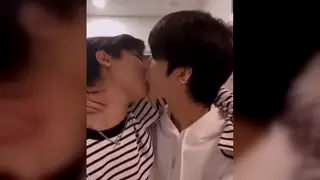 Handsome Asian Couple Share Passionate Kisses