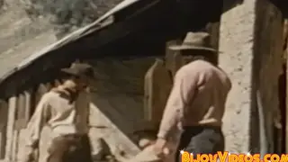 Muscular Cowboys Share Cocks in a Vintage Orgy