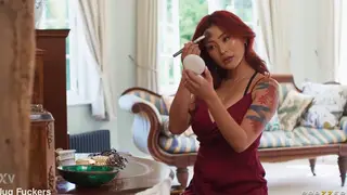 Blonde and Redhead Asian Duo Flaunt Curves in Lingerie at Club