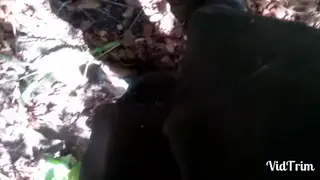 Mechanic in Coveralls Gets Serviced on the Job